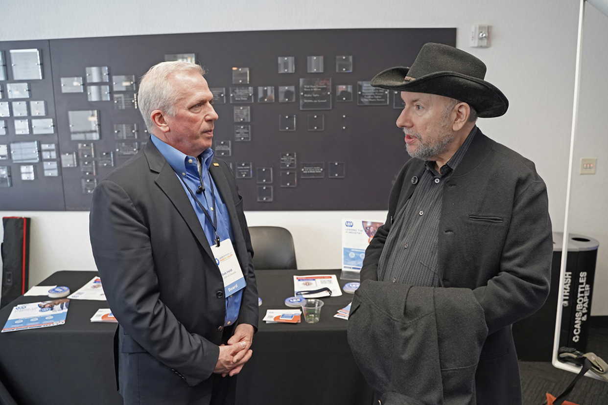 Bob Held and another attendee wearing a black cowboy hat, both members of LES, attend the Silicon Valley Deal Machine, an event hosted by the Silicon Valley Chapter, which brought together over 110 innovation leaders, IP professionals, and business dealmakers at the Computer History Museum in Mountain View, California.
